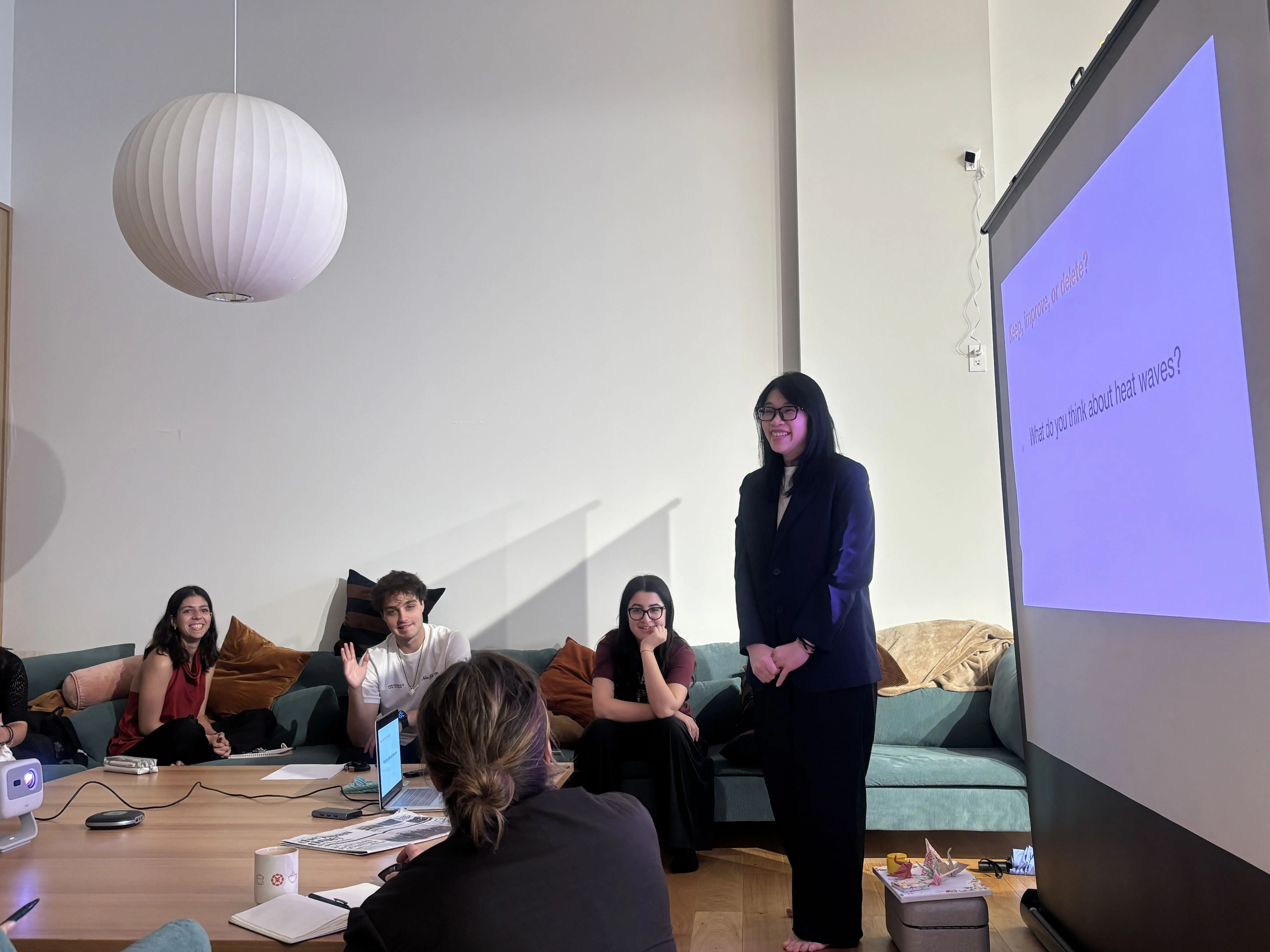 Rebecca smiling while facilitating a group coaching workshop